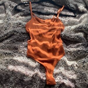 Lulu's Terracotta Ribbed Bodysuit